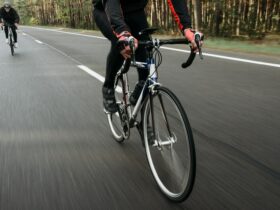 Photo of People Riding a Bicycle