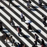 peoples walking on pedestrian lane